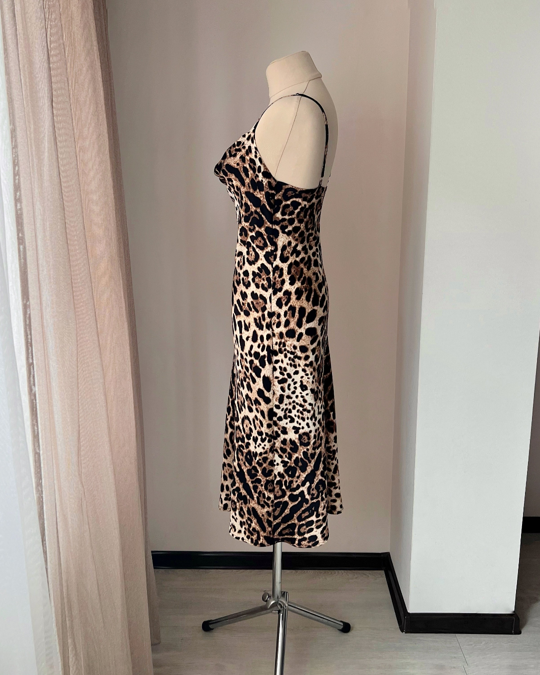 a dress on a mannequin in a room