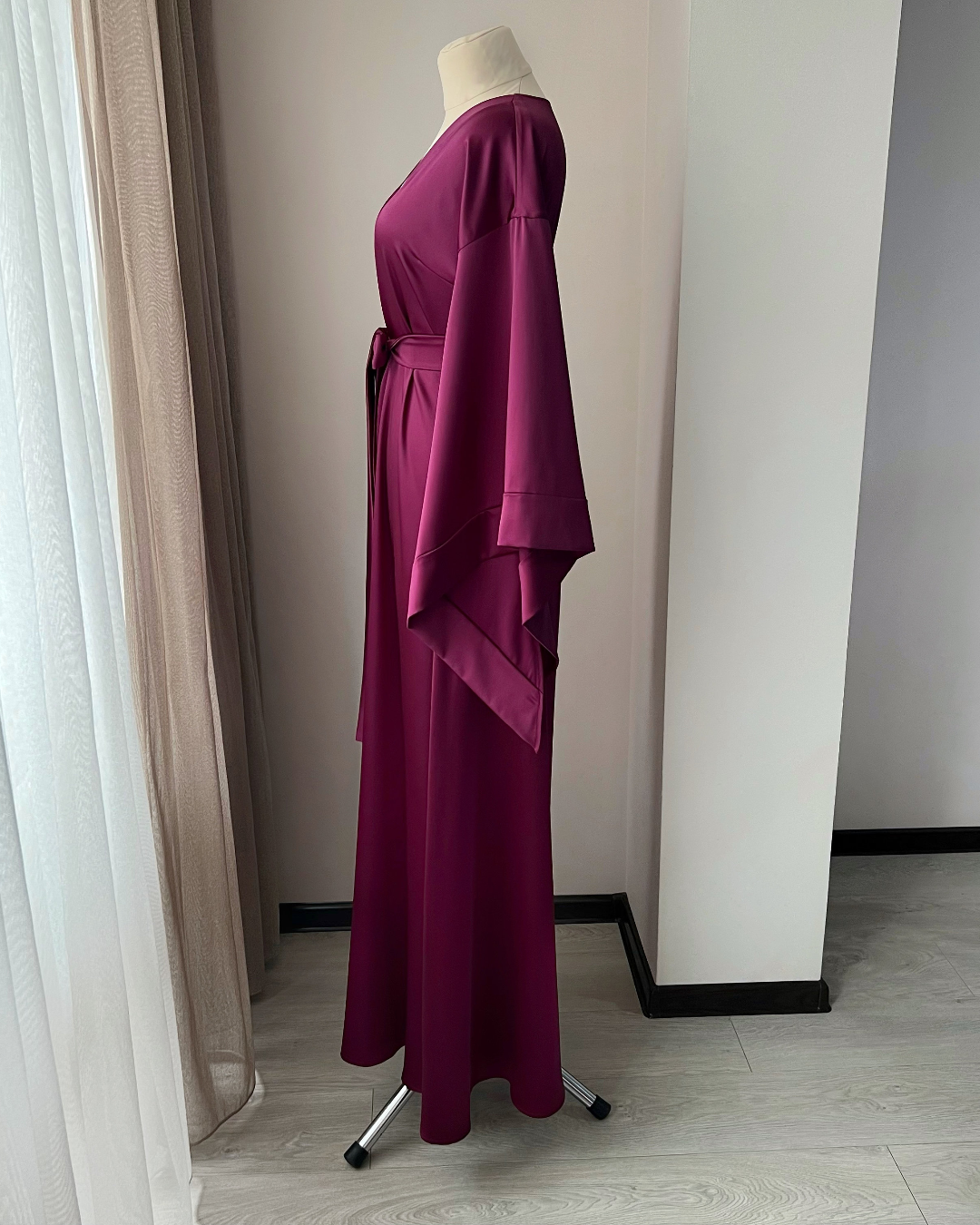 a dress on a mannequin in a room