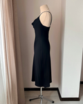 a dress on a mannequin in a room