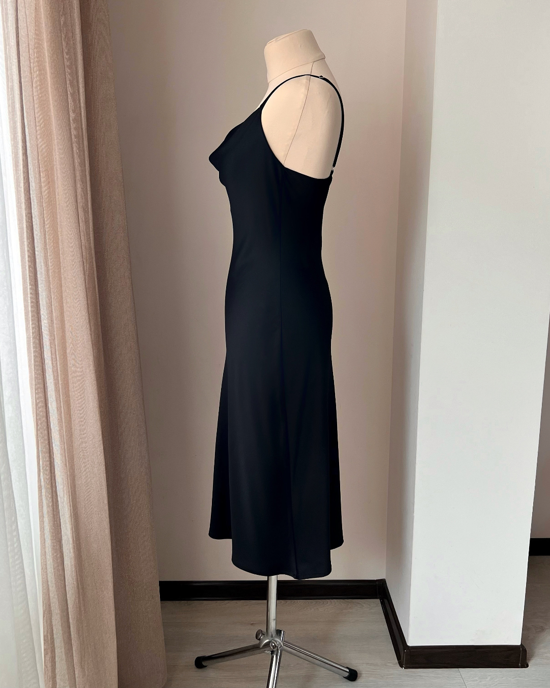 a dress on a mannequin in a room