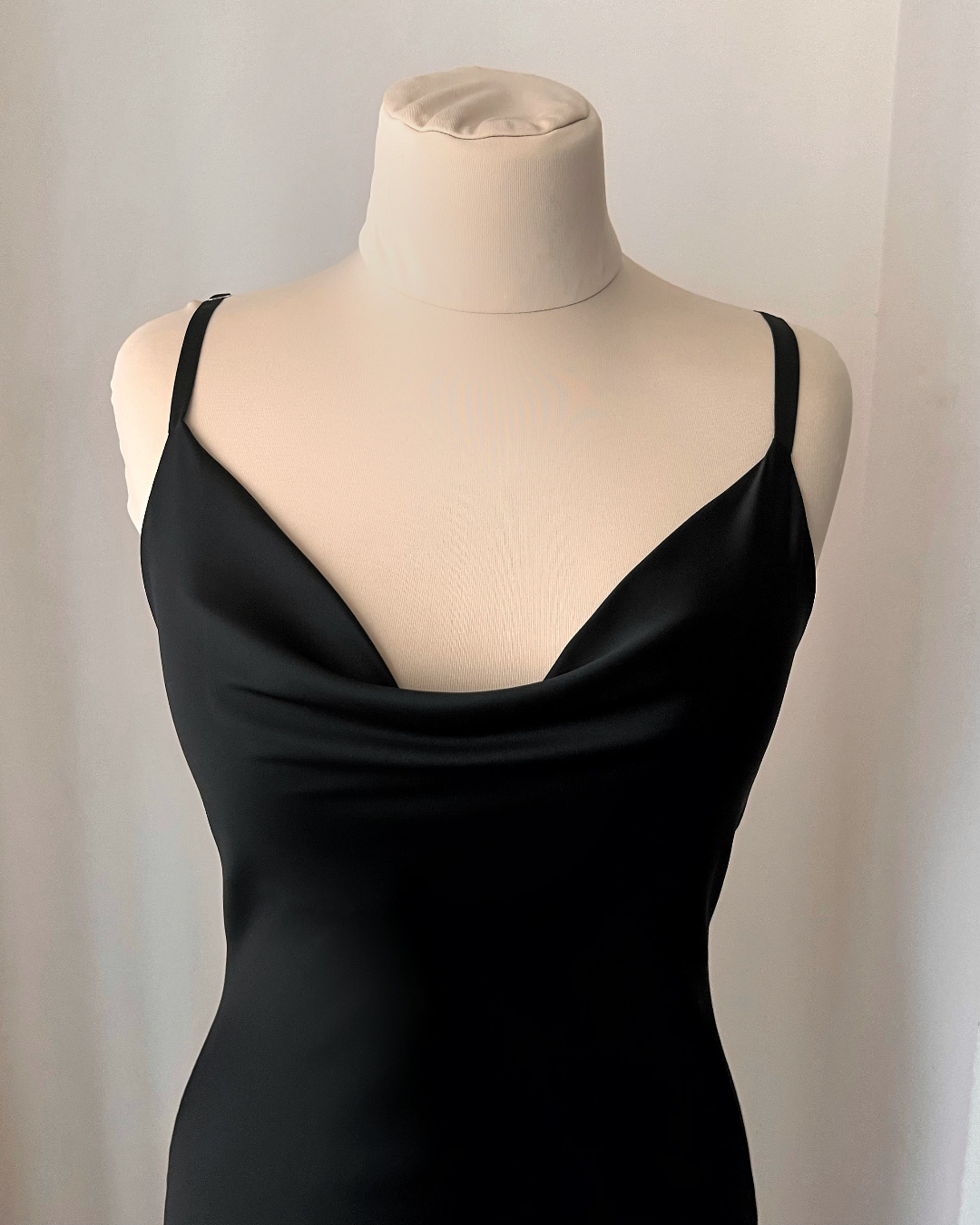 a black dress on a mannequin on a mannequin