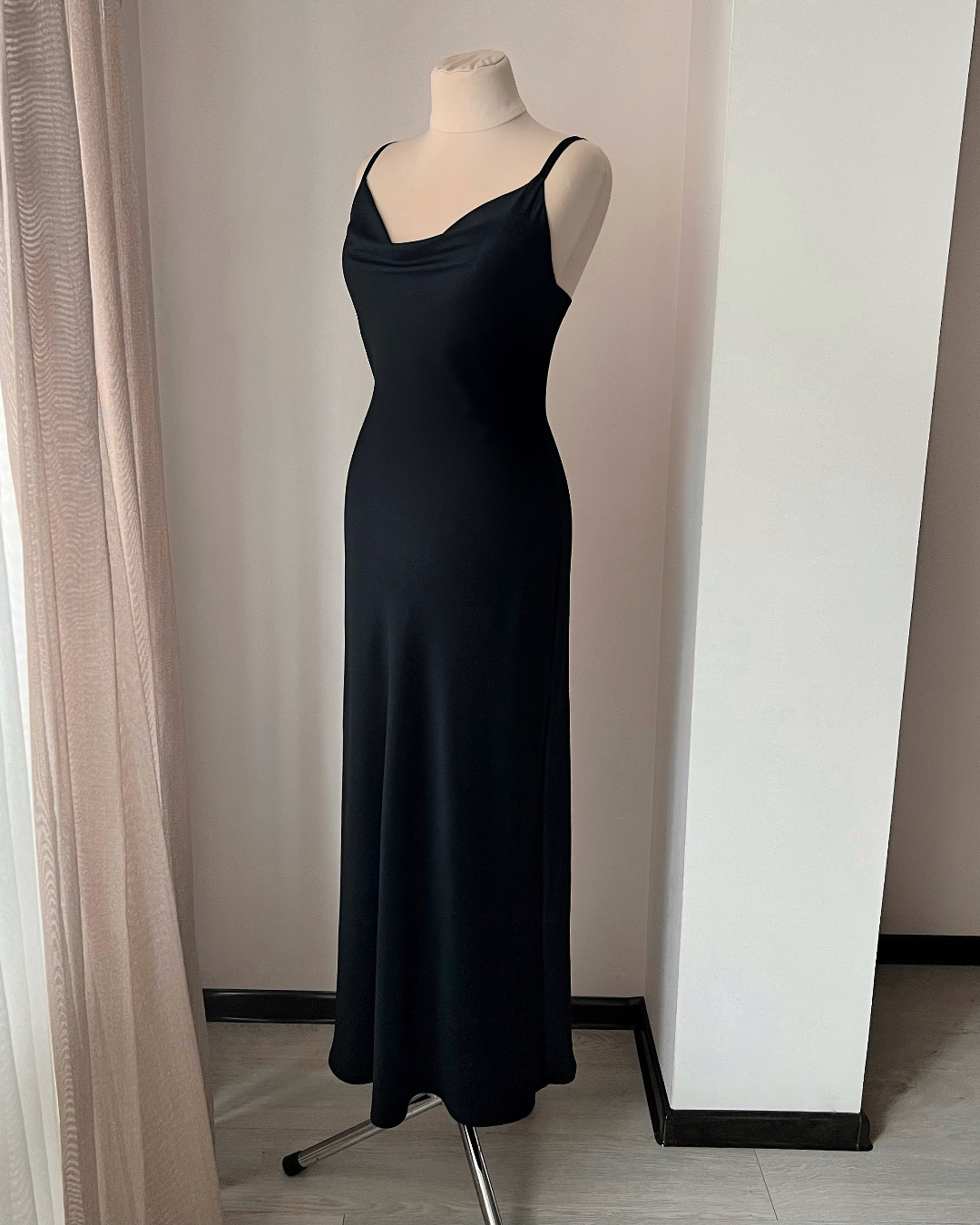 a dress on a mannequin in a room