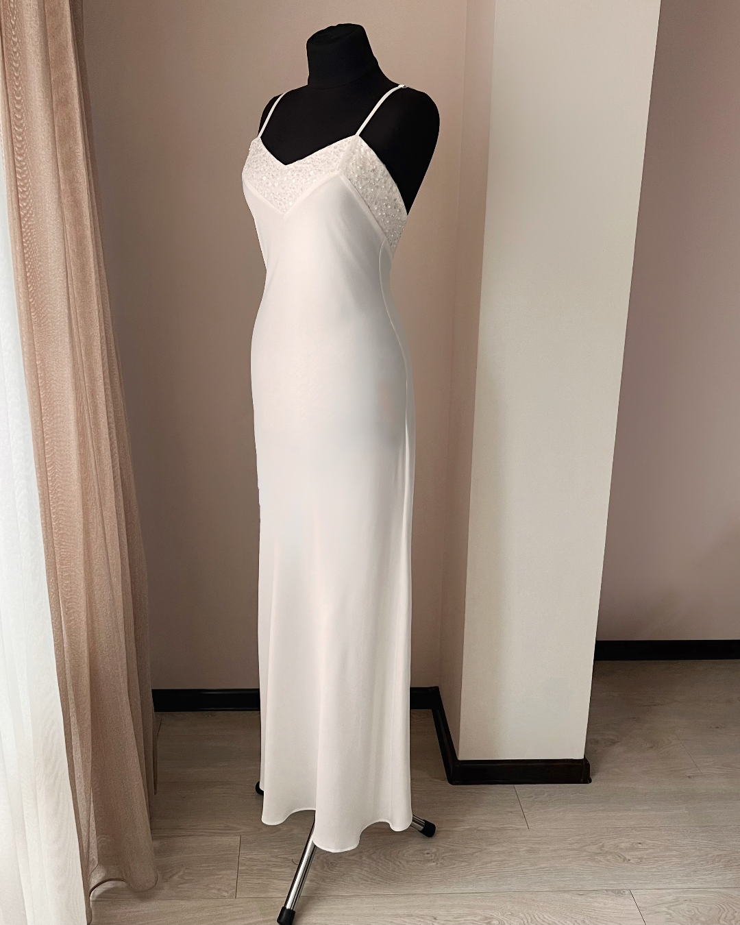 a dress on a mannequin in a room