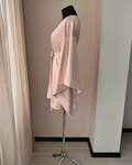 a dress on a mannequin in a room