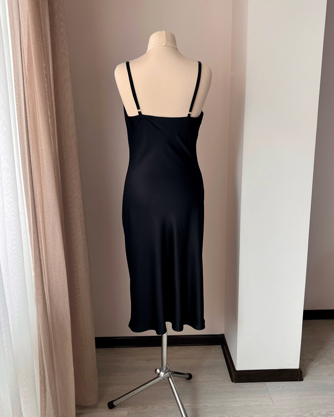 a dress on a mannequin in a room